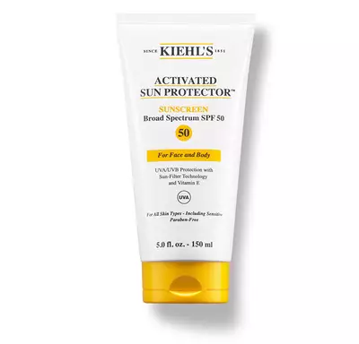 Tube of Kiehl's Activated Sun Protector sunscreen, SPF 50, designed for face and body, featuring UVA/UVB protection.