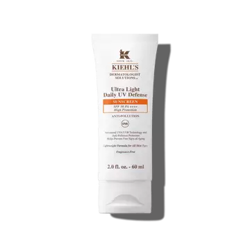 En 30 ml flaske med Kiehl’s Ultra-Light Daily UV Defense mot en hvit bakgrunn.