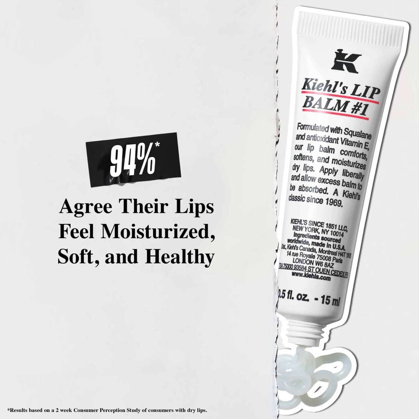 En tube Lip Balm #1 mot en hvit bakgrunn med teksten "94 % er enige i at leppene føles fuktet, myke og sunne."