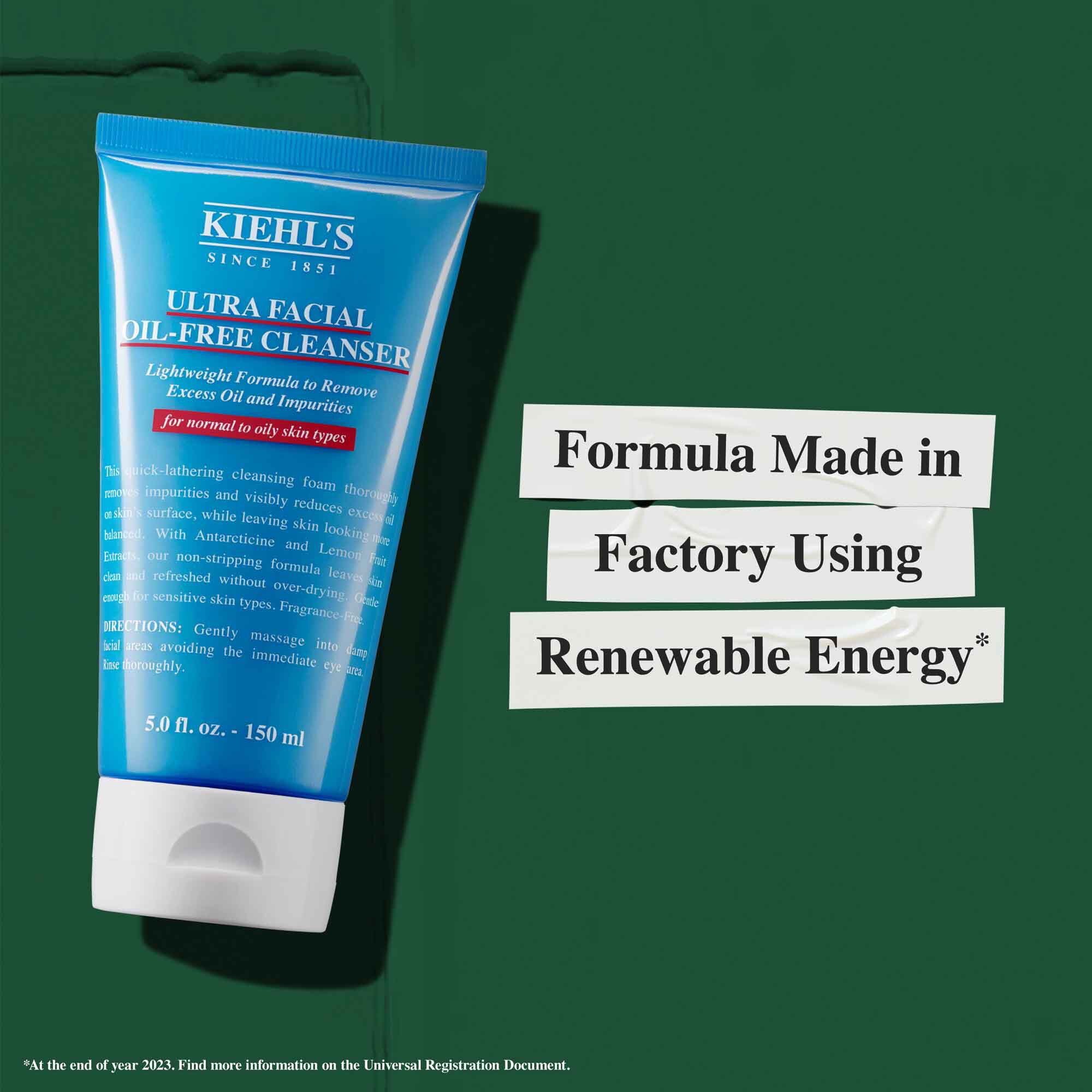 En tube Ultra Facial Oil-Free Cleanser med teksten "Formel produsert på en fabrikk med fornybar energi."