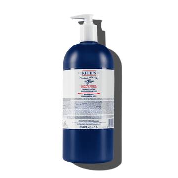 En flaske Kiehl's Body Fuel All-In-One Energizing Wash mot en hvit bakgrunn.