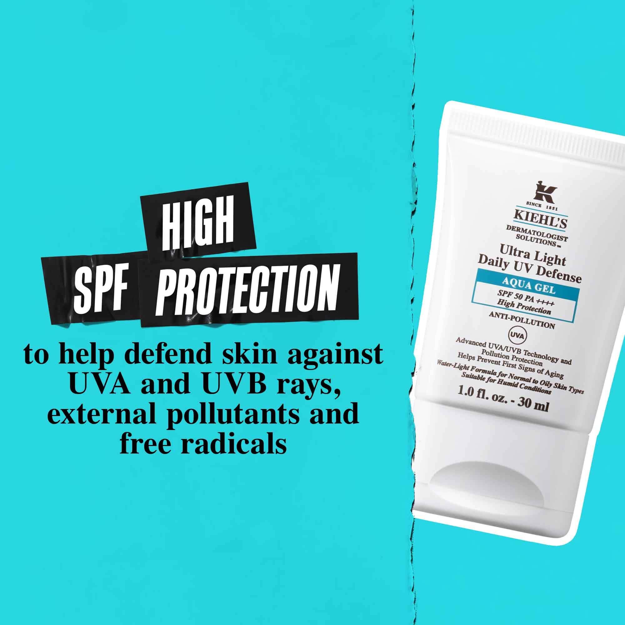 En tube Ultra Light Daily UV Defense Aqua Gel mot en blå bakgrunn med teksten: "Høy SPF-beskyttelse for å bidra til å forsvare huden mot UVA- og UVB-stråler, eksterne forurensninger og frie radikaler."